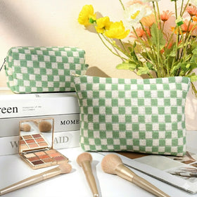 SOIDRAM checkered makeup bag in lifestyle scene with cosmetics