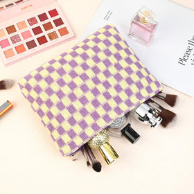 SOIDRAM Checkered Makeup Bag lifestyle scene with user