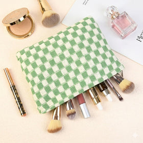 SOIDRAM checkered makeup bag set stacked for storage