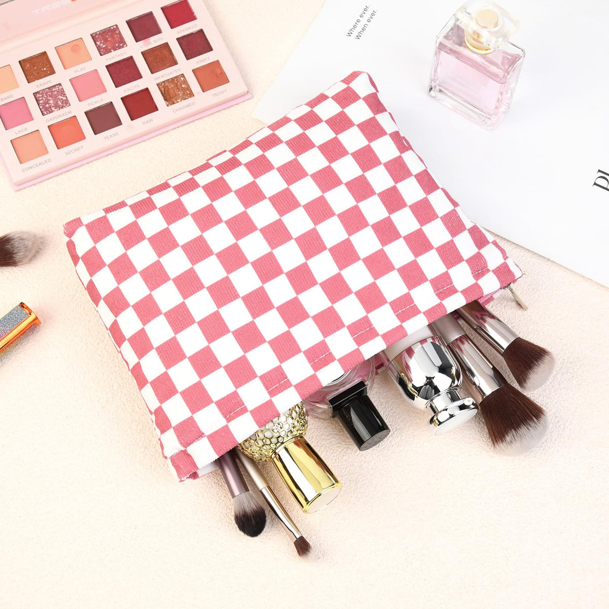 SOIDRAM checkered makeup bags stacked together
