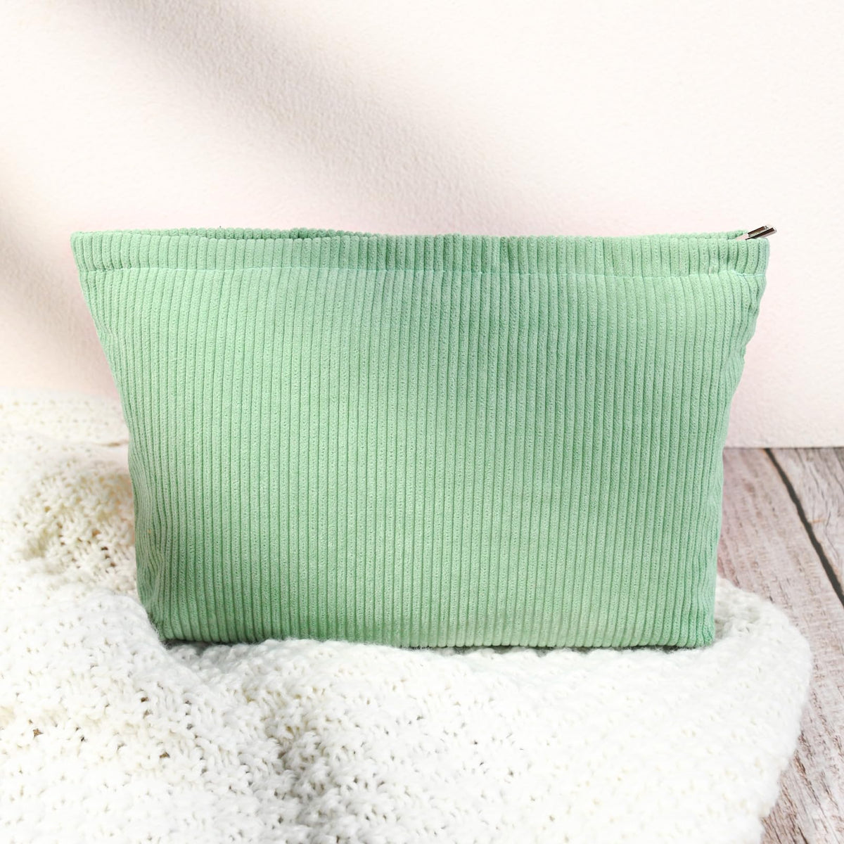 SOIDRAM cosmetic bag set displayed on a table