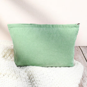 SOIDRAM cosmetic bag set displayed on a table