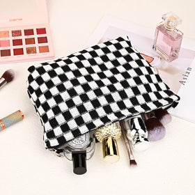 SOIDRAM cosmetic bag set on a travel suitcase