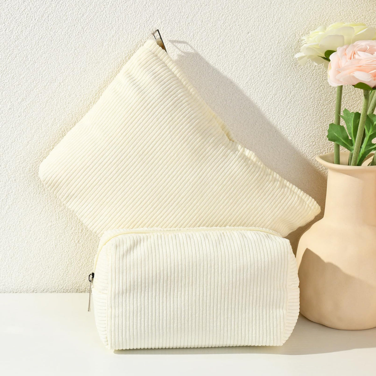 SOIDRAM cosmetic bags on bathroom counter