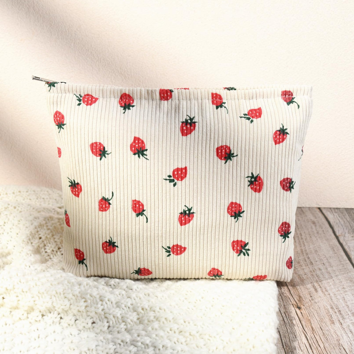 SOIDRAM Cute Makeup Bags set of two on a travel suitcase