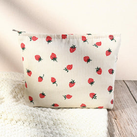 SOIDRAM Cute Makeup Bags set of two on a travel suitcase