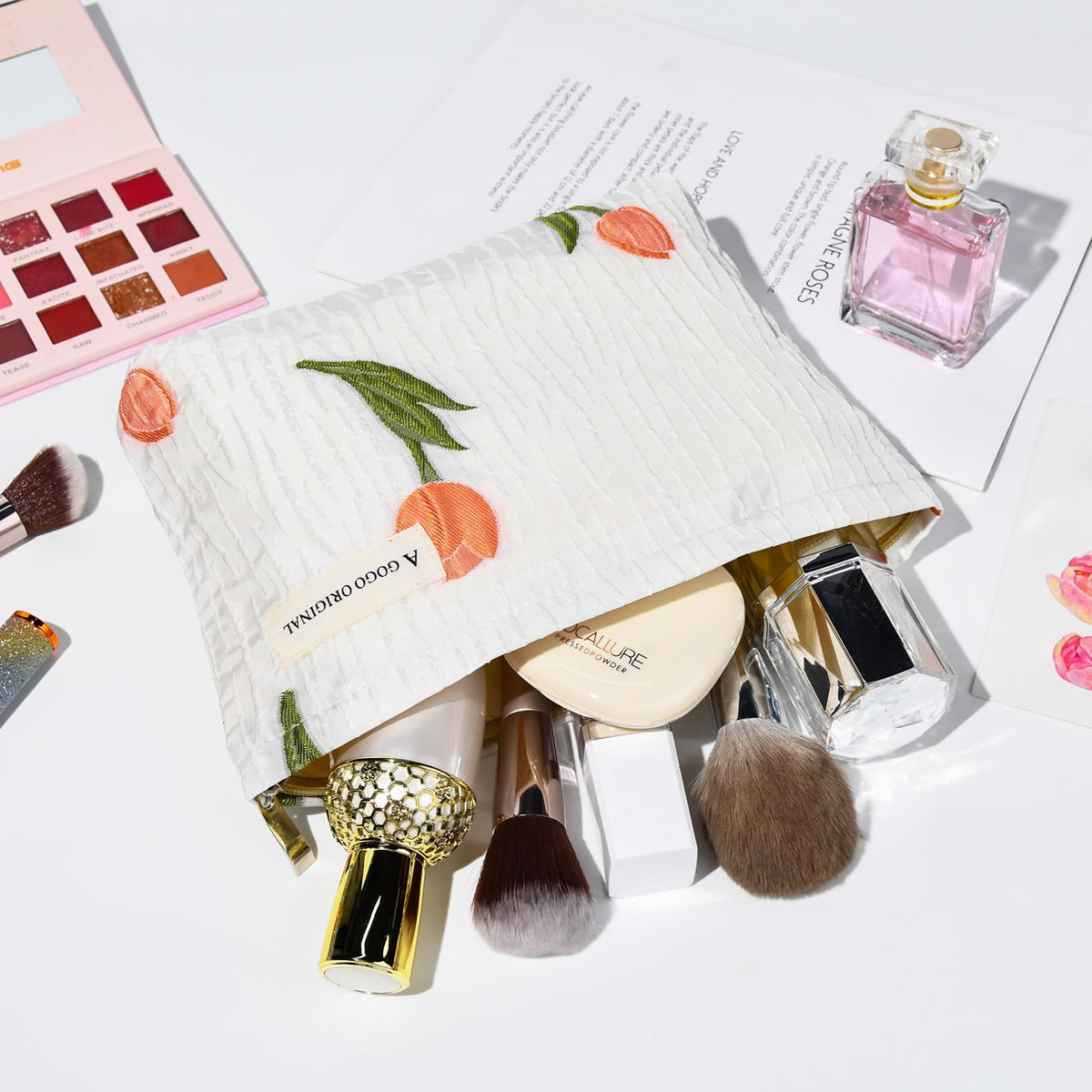 SOIDRAM floral makeup bag packed in a suitcase