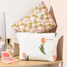SOIDRAM floral makeup bag set displayed with travel accessories