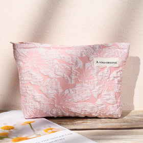 SOIDRAM Flower Makeup Bag Set displayed with travel accessories