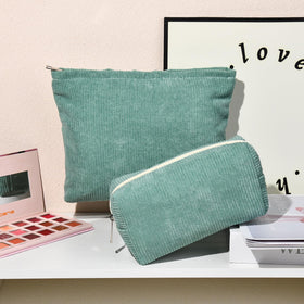 SOIDRAM green corduroy makeup bag with cosmetics