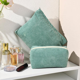 SOIDRAM green corduroy makeup bag with zipper open