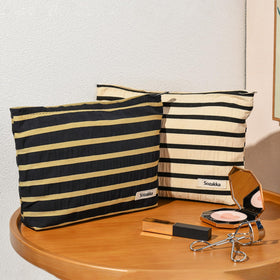 SOIDRAM makeup bag in a suitcase during travel