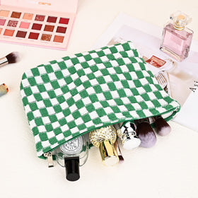 SOIDRAM makeup bag lifestyle scene with travel essentials