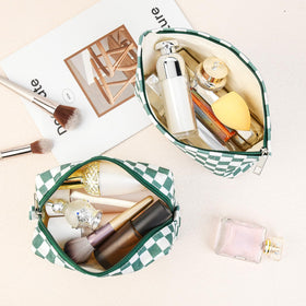 SOIDRAM makeup bag open showing contents