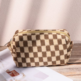 SOIDRAM makeup bag set displayed with travel essentials