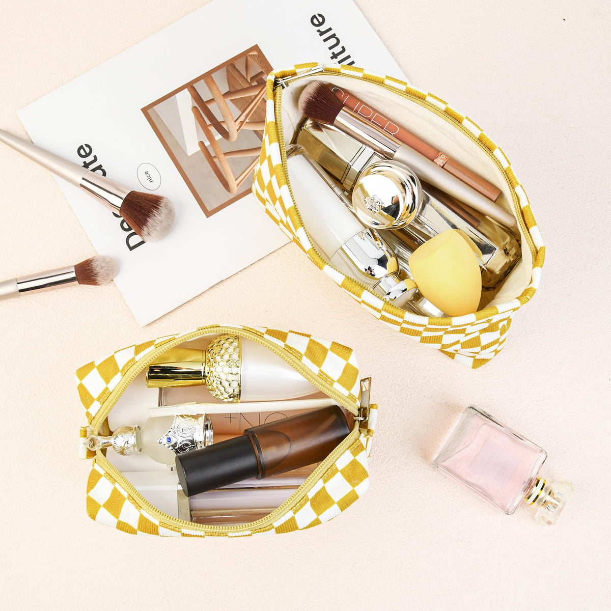 SOIDRAM makeup bag set on a travel suitcase