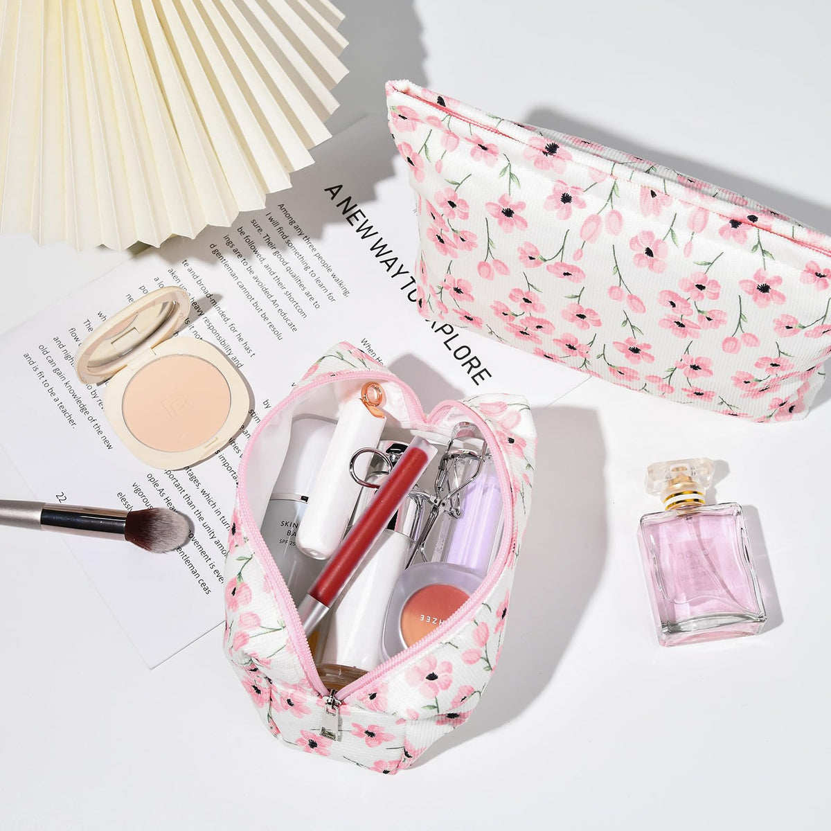 SOIDRAM makeup bag set on a travel suitcase