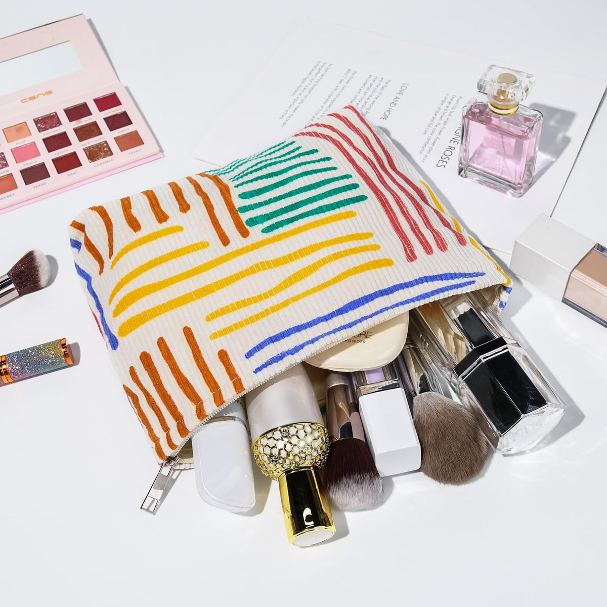 SOIDRAM makeup bags in various colors arranged neatly