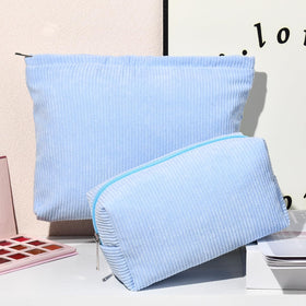 SOIDRAM small corduroy makeup bag side view in blue