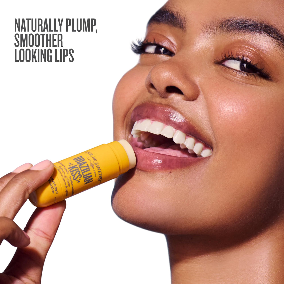 Sol de Janeiro Brazilian Kiss Lip Butter Balm with a close-up of the texture