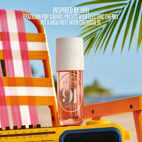 Sol de Janeiro Cheirosa 91 Hair & Body Perfume Mist 90mL with floral arrangement