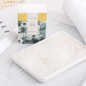 Spa Luxetique essential oil and bath puff
