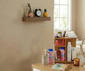 Spiretro Rotating Cosmetic Organizer on a bathroom countertop