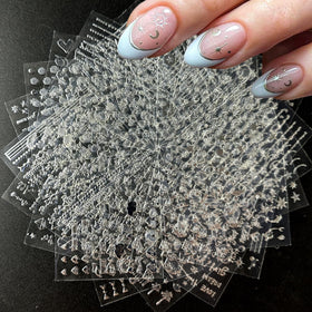 SPLOCUDU 30 sheets silver nail art stickers with various designs