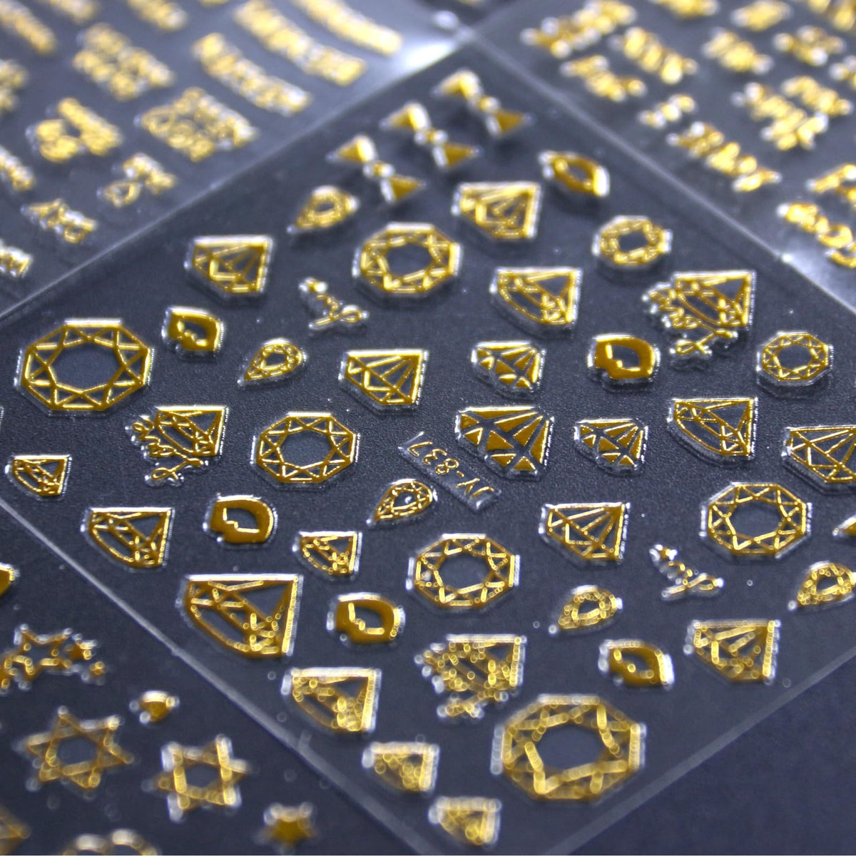 SPLOCUDU gold nail stickers applied on manicured nails
