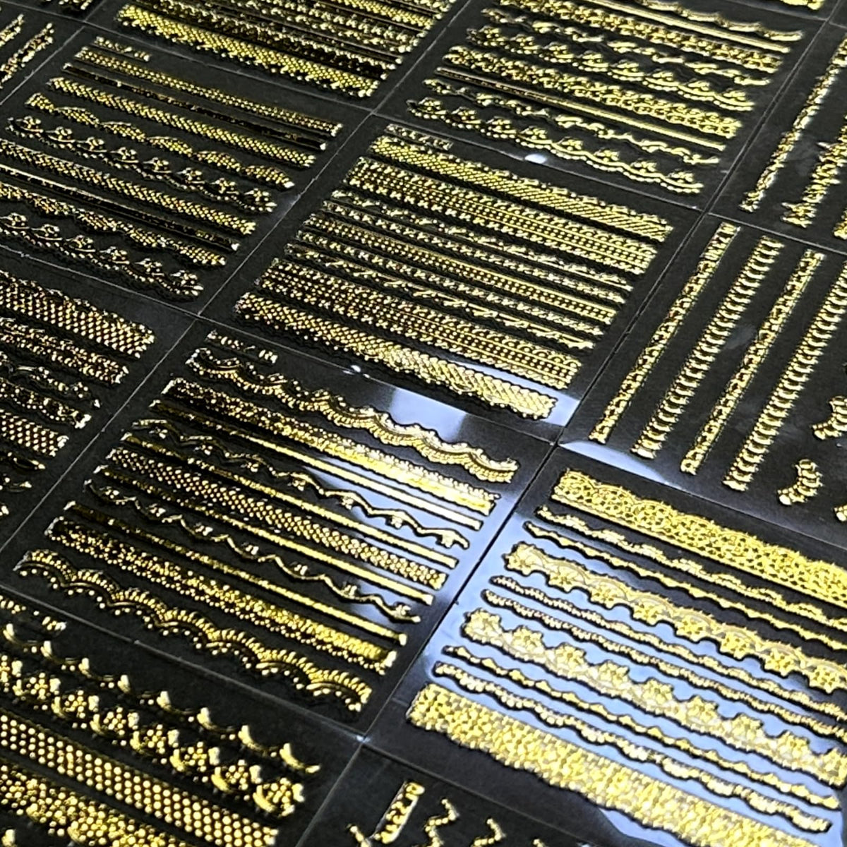 SPLOCUDU gold nail stickers displayed in packaging