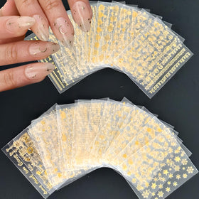SPLOCUDU gold nail stickers in packaging showing different styles