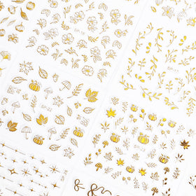 SPLOCUDU nail art stickers displayed on a manicure table