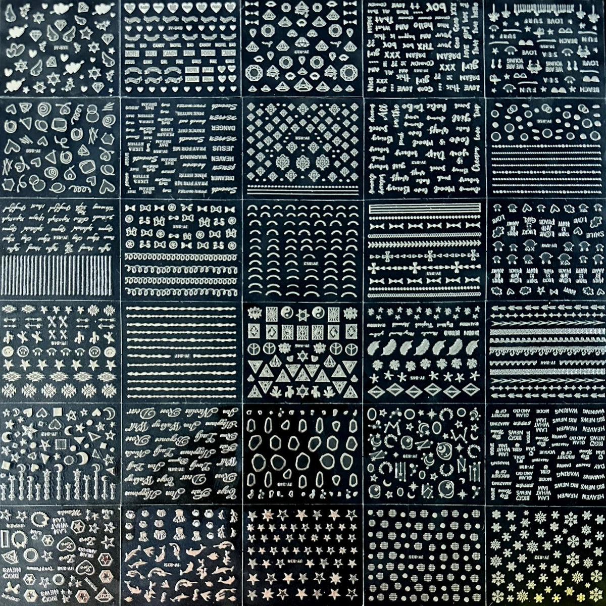 SPLOCUDU silver nail stickers arranged on a flat surface