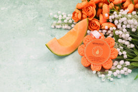 SPONGELLÉ Lily of the Valley Bath Sponge in a shower setting