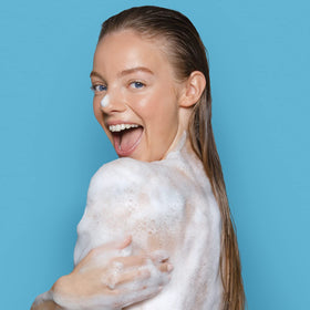 St. Ives body wash showing creamy lather in hands