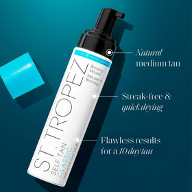 St.Tropez tanning mousse bottle with applicator mitt