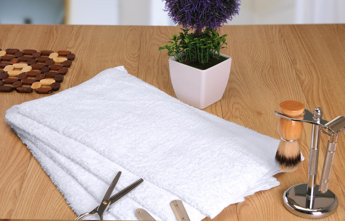 Stacked Utopia Towels Salon Towels in a bathroom setting