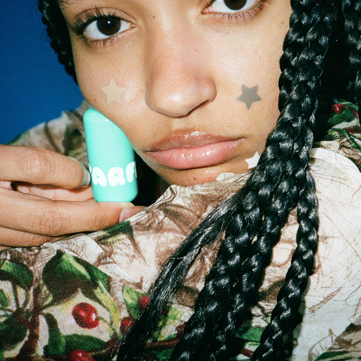 Starface Star Balm® Magic Mint being applied on lips