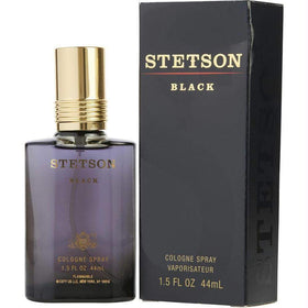 Stetson Black Cologne bottle side view on a wooden surface