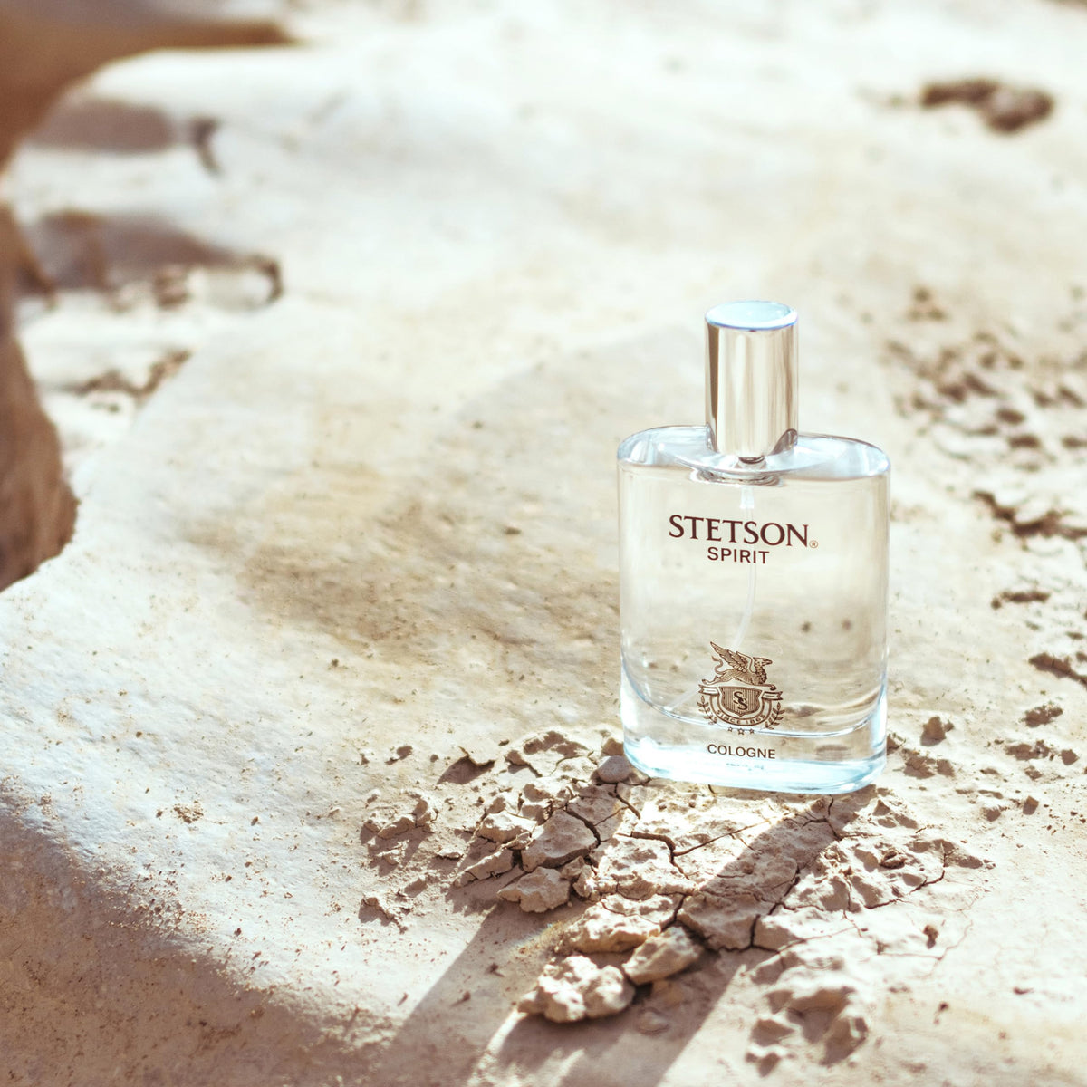 Stetson Spirit Cologne bottle on a wooden table