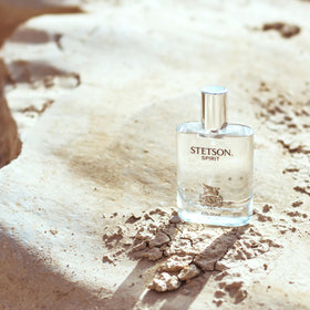 Stetson Spirit Cologne bottle on a wooden table