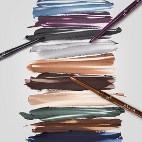 stila eyeliner in a beauty setup with brushes
