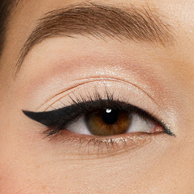 stila Waterproof Liquid Eye Liner on a vanity table