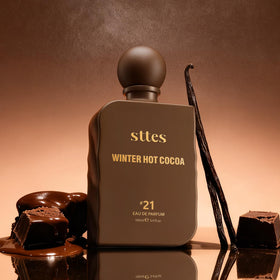 Sttes Perfume #21 bottle with warm cocoa background