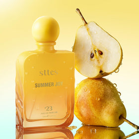 Sttes Summer Joy Eau de Parfum 100ml bottle on a summer table