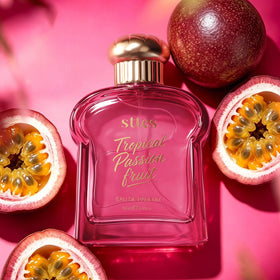 Sttes Tropical Passion Fruit Eau de Parfum displayed with tropical fruits
