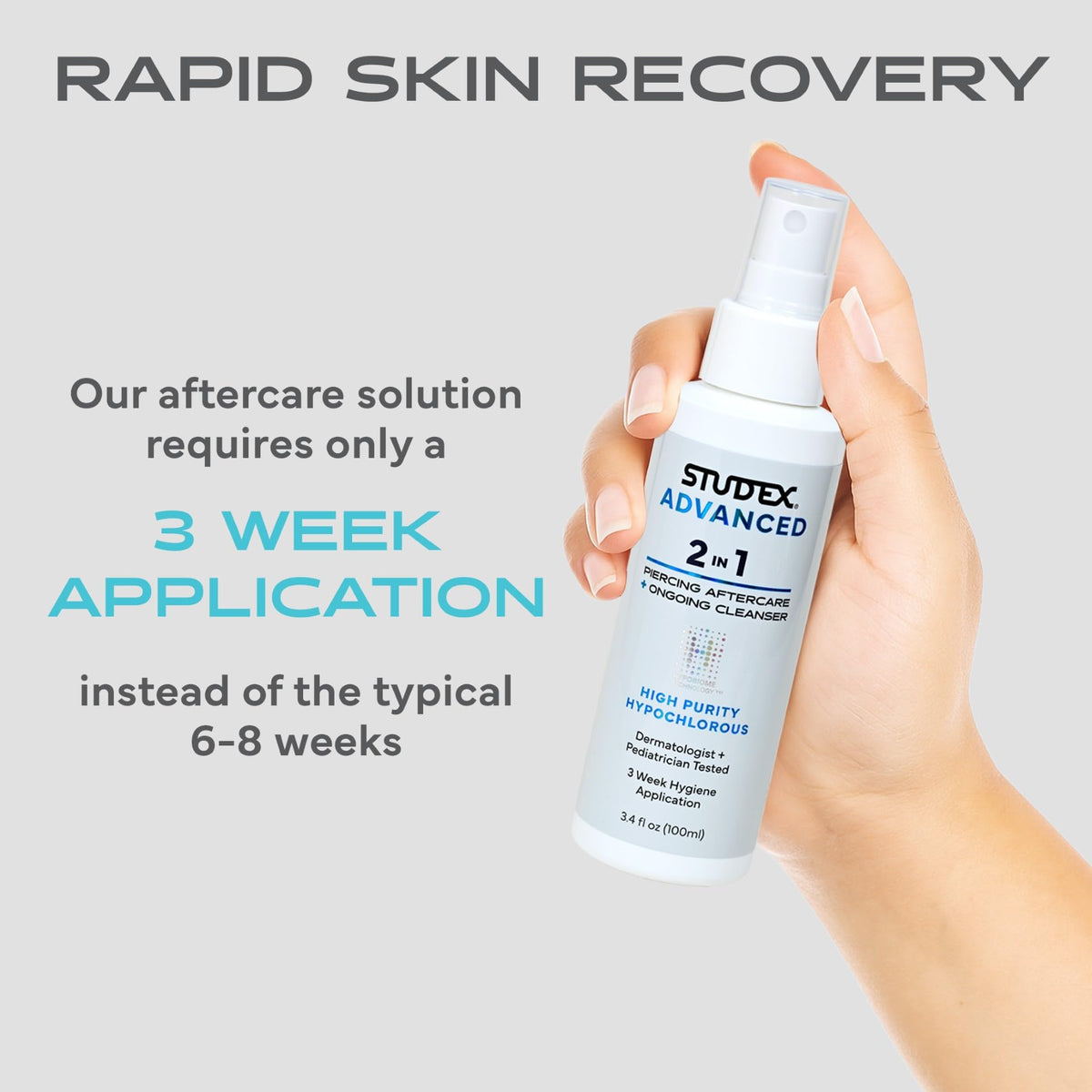 Studex Advanced 2-in-1 Piercing Aftercare spray on a bathroom counter
