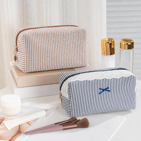 Stylish UUYUUY Makeup Bag on a vanity table