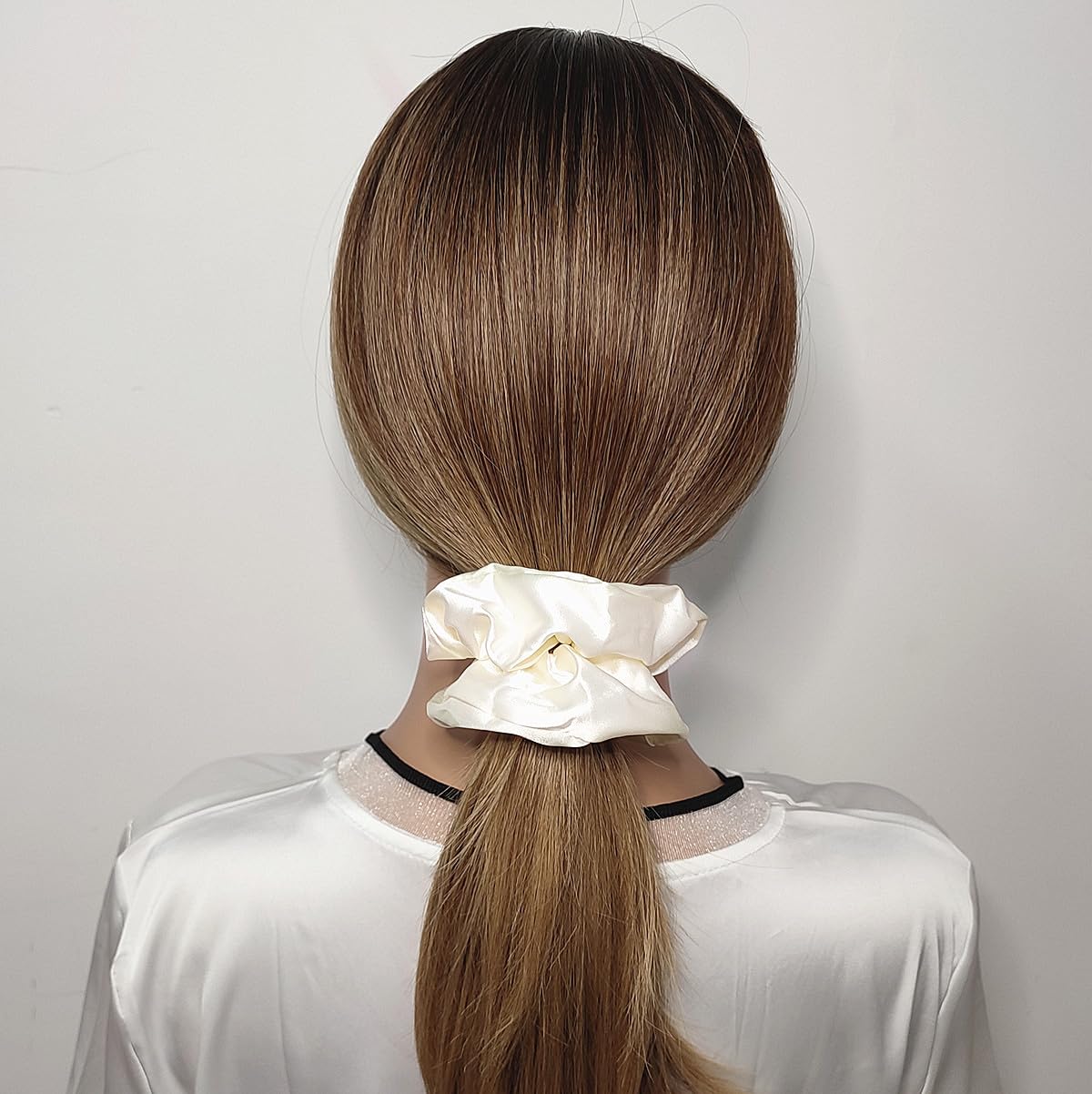 Sufermoe satin silk hair scrunchies displayed in a variety of light colours