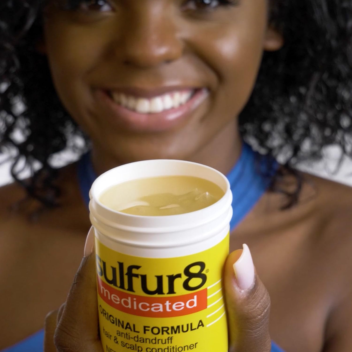 SULFUR8 conditioner on wooden surface